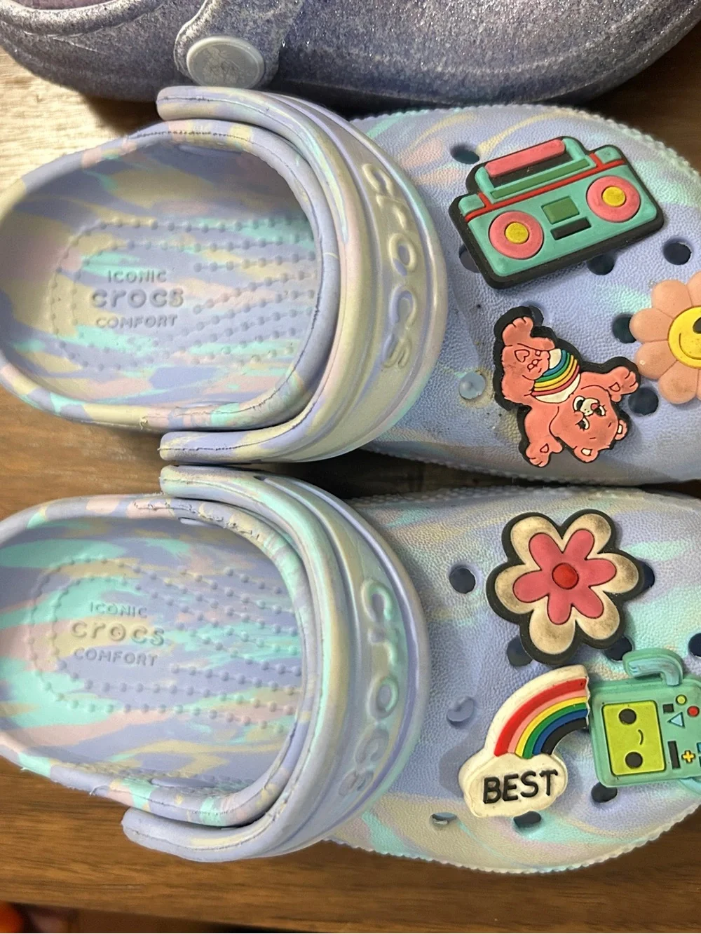 2 pair of CROCS 1 Lavender Glitter Plush-Lined Clogs and 1 tie dye with charms